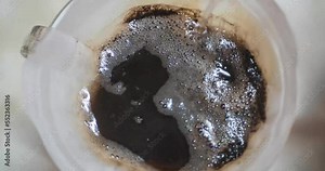 timelapse video while brewing chemex coffee, drip coffee, Barista pouring hot boil water from kettle on the coffee ground with filterfor morning drink
