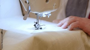 Tailor machine sewing The floating canvas, it adds structure to the front panel of a jacket, and ensures that the jacket drapes properly and maintains its shape over time