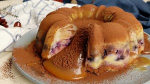 This bundt cake comes stacked with thinly sliced apples, a blueberry center, and oozes with an apple cider caramel center. | Sugar Fix