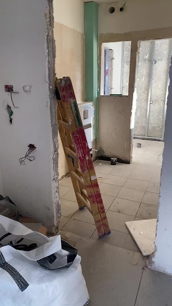 Construction Site Humor: The Worn Wooden Ladder