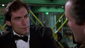 165K views · 8.5K reactions | Head of Section V, Saunders falls foul of some sabotaged automatic doors in THE LIVING DAYLIGHTS. The balloon that Bond pops has the words ‘smiert spionom’ written on it, which translates as ‘death to spies’. | James Bond 007 | Facebook