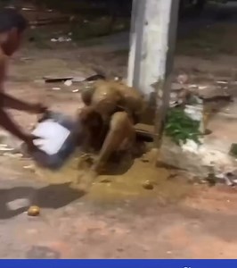 Angry Mob Throws Shit at Caught Thief