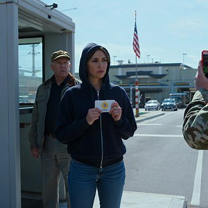 The doorman asked for identification. My dad showed his pension card. 'She was with me,' he said. 'Just a civilian.' I handed the doorman a card with the presidential seal on it. The scanner read 'Yankee White - first priority.' The doorman picked up the phone. 'VIP line. Now.' My dad looked at me in amazement. He spoke so calmly, as if he'd said it a thousand times before. "She's with me. Just a civilian." We were standing in the shadow of a giant American flag at the gate of a high-security ba