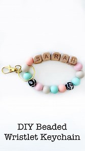 This Beaded Wristlet Keychain is a simple 5 minute craft that makes super cute party favors and gifts! Comment LINK below and I’ll send you a link to the full tutorial and supplies. It’s never too early to start making those holiday gifts! 😉🎁🎅🏼 | She's Crafty and She Knows It