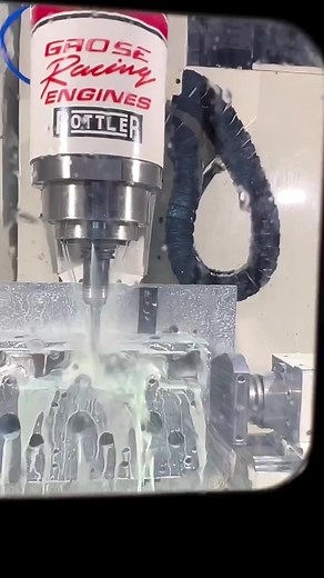 Working on some DRCE-3 cylinder heads for our in house program. #cncmachining #cnc #programming #GRose #groseracing #custommade #cylinderhead #5axis | Grose Racing Engines