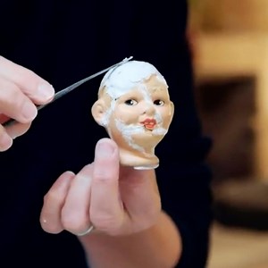 This charming but fragile sailor doll has been in the care of one family of football supporters for over 100 years! Can The Repair Shop team mend this lucky mascot enough to withstand any future cup final fixtures? | The Repair Shop