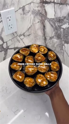 🤔 Fried Catfish Sushi Rolls… would you try these? 👀⁣ ⁣ ⁣ Recipe for sauce (on stove)⁣ 2 cup Sugar⁣ 2 tbsp water⁣ 1 oz tobacco hot sauce⁣ 4 oz cane vinegar ⁣ ⁣ ⁣ Featured: @briangelecooks⁣ ⁣ #BlackFoodieFinder⁣ ⁣ ━━━━━━━━━━━━━━━━━━━━━━⁣ 𝗚𝗲𝘁 𝗿𝗲𝗰𝗶𝗽𝗲𝘀 𝗳𝗮𝘀𝘁 – Comment “recipe” or visit 𝗕𝗹𝗮𝗰𝗸𝗙𝗼𝗼𝗱𝗶𝗲.𝗰𝗼𝗺⁣ ━━━━━━━━━━━━━━━━━━━━━━⁣ ⁣ 𝗙𝗼𝗹𝗹𝗼𝘄 @𝗯𝗹𝗮𝗰𝗸𝗳𝗼𝗼𝗱𝗶𝗲𝗳𝗶𝗻𝗱𝗲𝗿 — the #1 platform for Black food, flavor, and culture worldwide.⁣ ⁣ 𝗩𝗶𝘀𝗶𝘁 𝗼𝘂𝗿 𝘄𝗲𝗯𝘀𝗶�