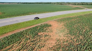 Check out the incredible hook-shaped trench from the violent suction vortex that slammed the Dominator 3. It almost appears as if the launch/Dominator barrier/gap in the terrain intensified the vortex on approach to the vehicle. The vortex hit the front of the vehicle with the anemometer in back measuring 132 mph northerlies. The suction vortex was moving at 62 mph, with 124 mph of shear from the back to the front of the Dominator 3 causing it to spin while in park. This is just th cusp of the g