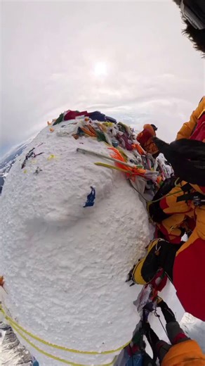 Your body has roughly 20 hours to live above what climbers call Everest's death zone. The summit sits on the wrong side of that line. The people in that photo are dying as they take it.Up there, the air holds about a third of the oxygen you'd breathe at sea level. Your blood oxygen drops from a healthy 95% to 50 or 60. At any hospital on Earth, those numbers trigger a medical emergency.Your brain starts running on fumes. Climbers describe feeling drunk, hearing voices, seeing people who aren't t