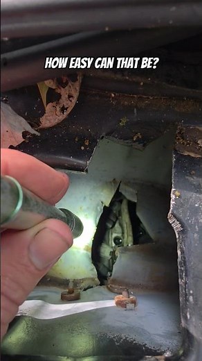 The easiest way to remove a spark plug from a Ford Triton v8