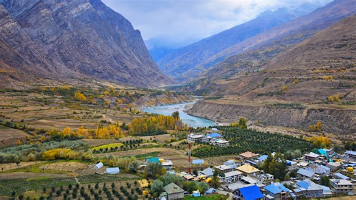 Serenity between mountains and river in Himalayan valley
