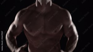 Muscular man running towards camera, torso shot center
