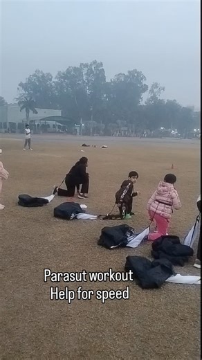 Himanshu Singh on Instagram: "😊 Parachute workouts, also known as parachute training or resistance parachute exercises, are a fun way to boost strength, speed, and agility. You use a parachute (like a big colorful umbrella) to create resistance while doing exercises or running drills. Some popular parachute workout ideas: - Resistance sprints: Run with the parachute to build power. - Lateral shuffles: Move side-to-side for agility. #speed #coaching #fitnessmotivation #fun 🏋️‍♂️"