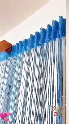 This bright rose-patterned curtain is a densely packed, thickened, and decorative partition curtain