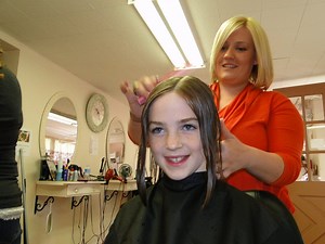 Two SASJ Students Donate to Locks of Love