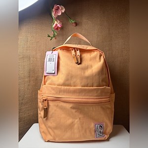 🍑 Lola Peach Backpack with Front Pocket NWT 🍑 color Peach