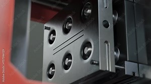 Animation of the industrial automated machine processing the plastic material. Industrial automated equipment moulding the plastic. Automated industrial tool creating multiple plastic items.