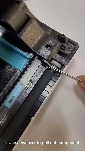 Label Range Troubleshooting: printer is jammed around rubber roller