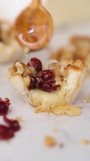 Gina Homolka - Healthy Recipes on Instagram: "Save to make later!! Easy 5-ingredient mini baked brie phyllo cups topped with craisins, walnuts and honey. Delicious bite-sized appetizers, perfect for the Holidays! Recipe link in profile https://www.skinnytaste.com/skinny-baked-brie-phyllo-cups-with/ #appetizers #bakedbrie"