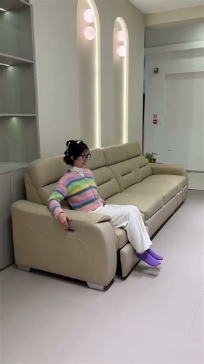 My new sofa bed arrived! It has all sorts of lazy-person features—it transforms into a big bed