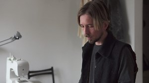 Tailor drawing a design for sewing - Free Stock Video