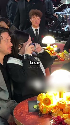 Celebrities weren't allowed to bring their cell phones to the Grammys, so they had to make do! 😅