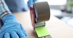 Worker Sealing Cardboard Box Tape Using Stock Footage Video (100% Royalty-free) 1086538265 | Shutterstock