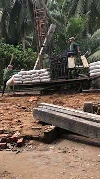 Farmer's Homemade Hydraulic Pile Driver