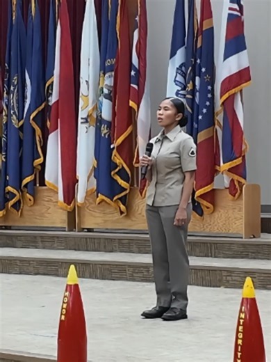Mia sings the National Anthem at U.S. Army Basic Training graduation