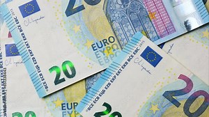 Twenty euro background. Close up on Many euro money bills. EU money banknotes. Money or European union currency concept. Man hand counting euros