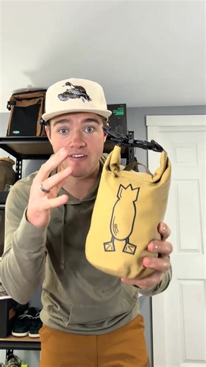 The Divebomb Waterproof Shell Bag keeps your shells and gear dry no matter the conditions. Durable, fully waterproof, and built for serious hunters who need reliability in the field. | Feelaccord