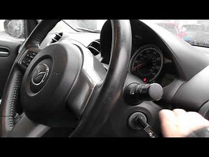 How do you program the key of the Mazda 2?