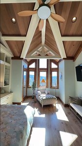 Master suite with vaulted trusses and mountain views #TimberFrame #PrimarySuite #MountainHome