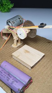 #experiment #project #science Hello friends, I have made a small cutting machine. It is not very powerful but it can cut small objects. In this I have used a six volt motor and a cutting blade. Follow to the channel to watch such short electric videos. | The magic project