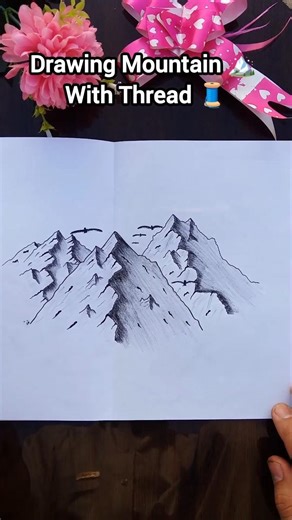 Drawing mountains with thread