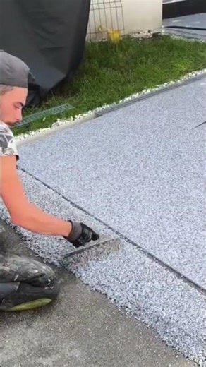 the process of plastering sand powder mixture on a large yard #construction #popular #viralshorts