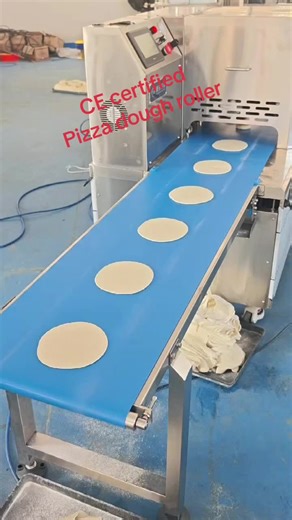 This gets dough stretching easier and faster #pizzaspinnermachine #pizzaformer#pizzaequipment #pizzadoughsheeter #flatbreadmachine #pizzabasemaker #pizzacrust #pancakerollingmachine #bakerymachine #bakeryequipment