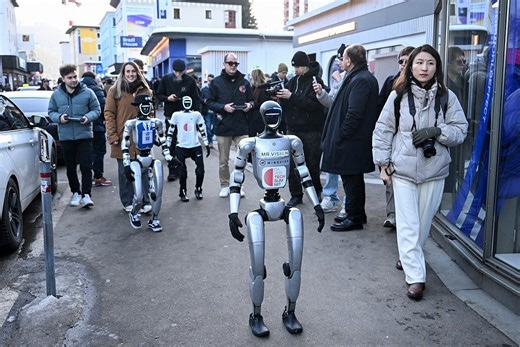Robots parade through streets of Davos