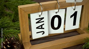 Handmade wood calendar with date month and day. January 01, planning for the day. New plans and tasks for the year.