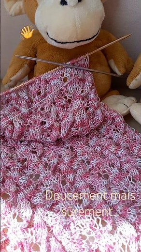Knitted stole with lace pattern