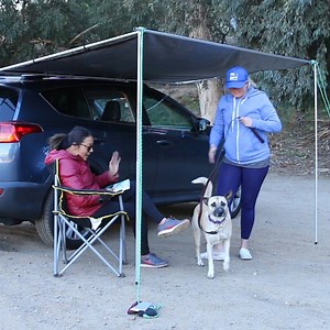 This collapsible outdoor car awning is perfect for camping, tailgating, and any other time you need a little shade! 🚗 | Nifty Outdoors