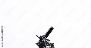 dark black aegirine crystal rotating 360° loop isolated on white background. macro detail background. close-up Rough raw unpolished semi-precious gemstone.