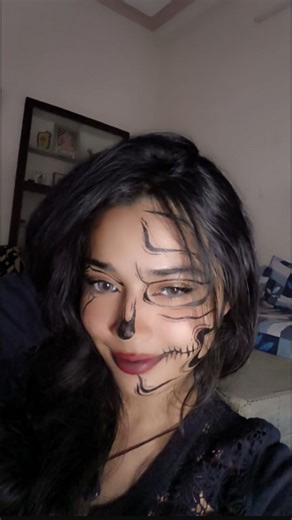 Mahek!? on Instagram: "Half beauty,half bones💀❤️‍🔥 . . . Halloween makeup reel, half skull face makeup, glam skeleton look, spooky Halloween reel, Halloween makeup 2025, aesthetic Halloween makeup, skull art makeup, creative Halloween ideas, Halloween transition . . . . #HalfBeautyHalfBones #HalloweenMakeup #SkeletonMakeup #SkullLook #HalloweenReel #SpookyGlam #MakeupTransformation #HalloweenVibes #GlamAndGore #CreativeMakeup #SpookySeason #MakeupReel #HalloweenBaddie #SkeletonVi