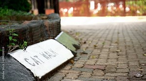Close-up of a walkway sign in Johannesburg Zoo, South Africa