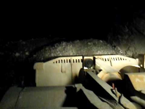 bogger loading a truck