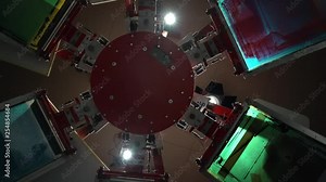The process of silk screen printing on carousel in dark room