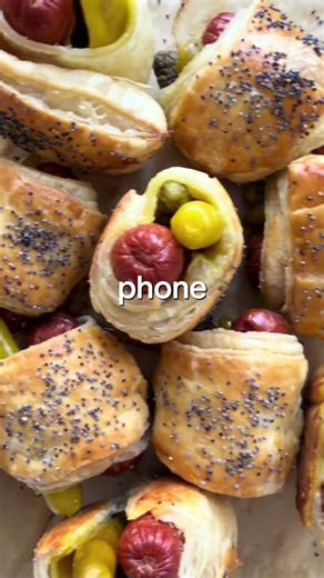 Mini Chicago Style Hot Dogs. Perfect for any party! 🌭🌭🌭 Ingredients -1 pack mini hot dogs (all beef) -1 sheet puff pastry (remove from freezer 1 hour before using) -12 sport peppers -12 cornichons -poppy seeds -1 egg -mustard for dipping Directions 1. Preheat oven to 375F. Line a baking sheet with parchment paper. Dry off sport peppers, cornichons and mini hots with paper towel, set aside. 2. Flour a clean surface, roll out puff pastry to a 9x9 square. Cut in half horizontal then cut each hal