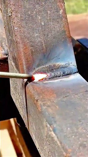 Welding Metal Joints Precisely Using An Electric Arc Welder To Create Strong Iron Structures