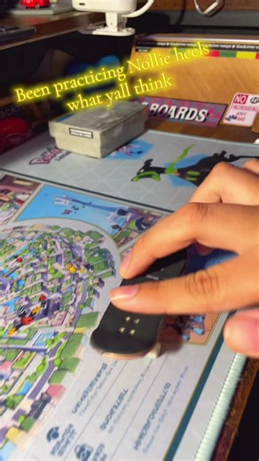 Nollie heel on finger board leave me some tip plz #fypシ #fyp #quarterzip #unclebob #fingerboard