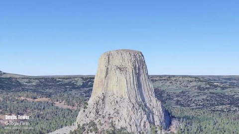 Devils Tower aerial view over Wyoming forest